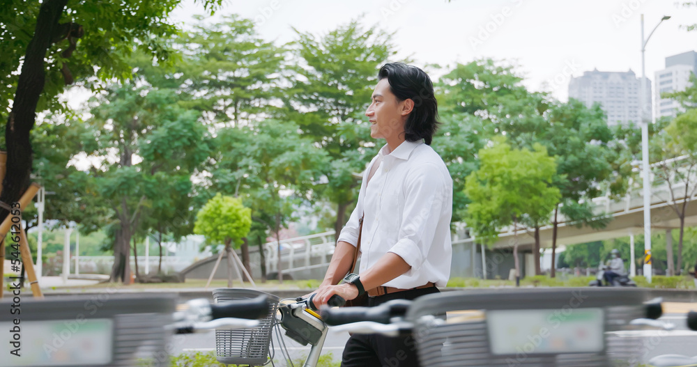 asian man commuting