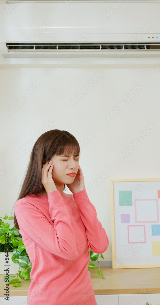 asian woman is suffering noise asian woman is suffering noise