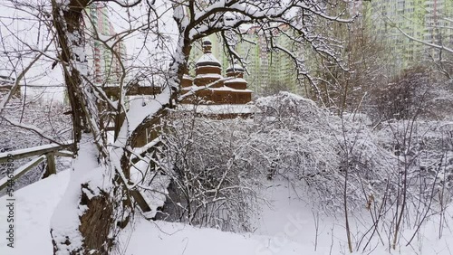 Snowy thickets and church domes, Mamajeva Sloboda Cossack Village, Kyiv, Ukraine photo