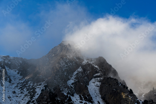 Winter mountain landscape. Foggy weather in mountains. © Alexey Seafarer