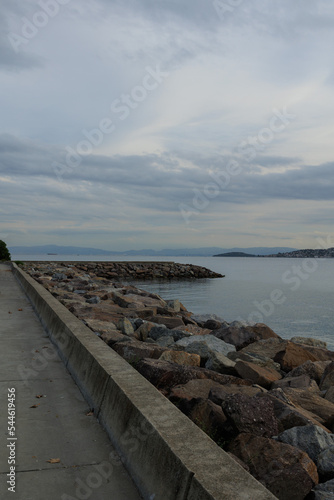 Sea coast  promenade for walks and stones  breakwaters and ships. On the streets in Istanbul  public places.