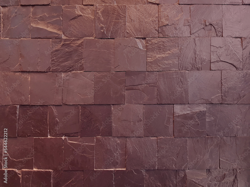 Obraz premium Red stone wall texture (Granite, marble). Cut into squares and arrange them together. With copy space.