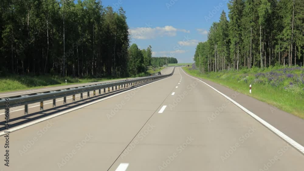 Highway wide road, transport and blue sky with clouds on a summer day Highway wide road, transport and blue sky with clouds on a summer day