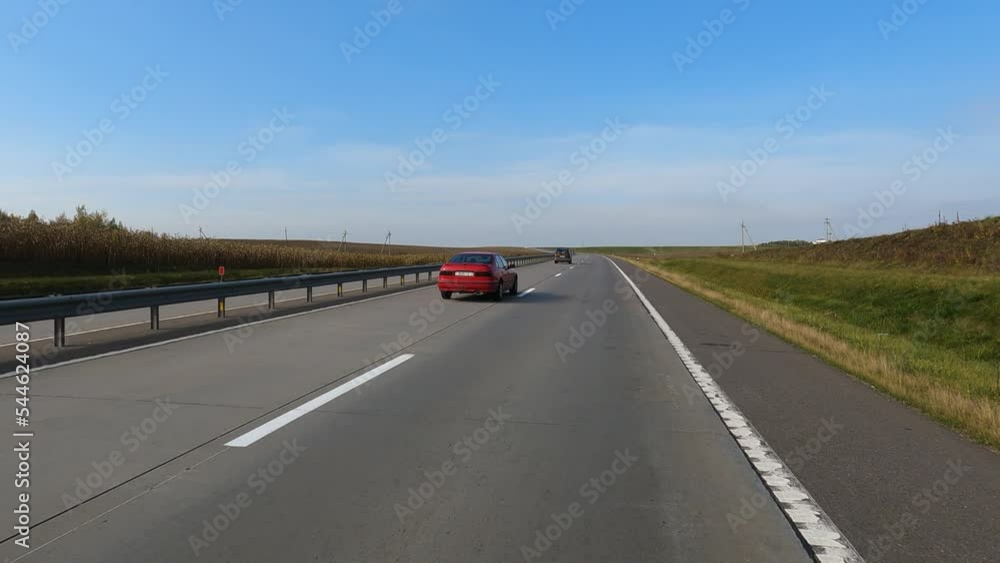 Highway wide road, transport and blue sky with clouds on a summer day Highway wide road, transport and blue sky with clouds on a summer day
