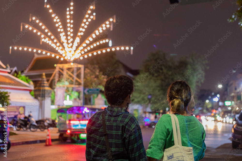 Obraz premium people walking on the street at night