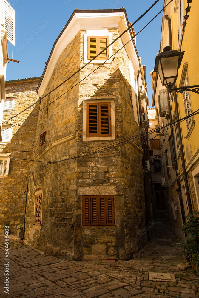 A quiet backstreet in the historic medieval centre of Piran on the coast of Slovenia
