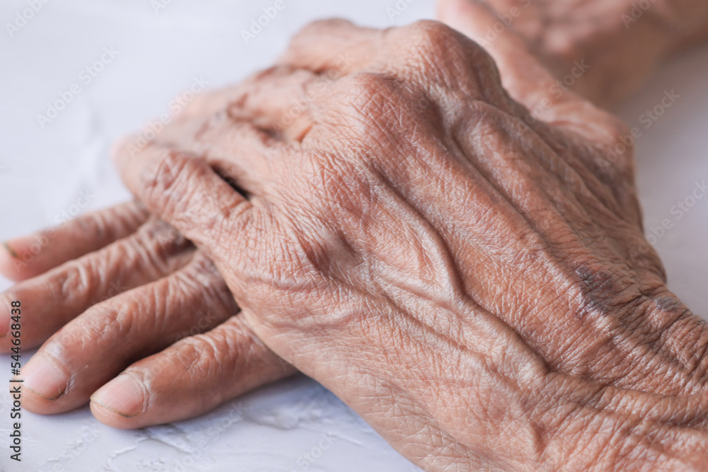 Fototapeta premium close up of hands of a elderly person