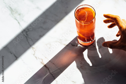 Mexican Firing Squad cocktail, tropical and refreshing drink with tequila, lime juice, grenadine and angostura bitters