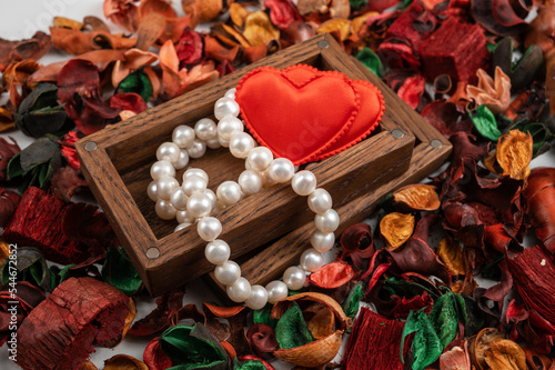 Pearl jewelry with red hear...