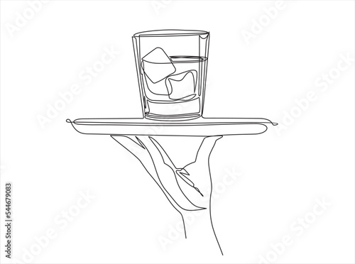 Continuous line vector illustration of hand holding dish with glass with whisky drawn from the hand a picture of the silhouette. Line art. 