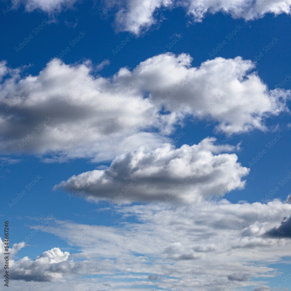 Fototapeta premium a beautiful blue sky day with white clouds as background