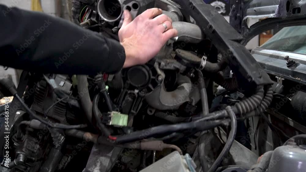 engine repair removing from a gray old car for tuning engine repair removing from a gray old car for tuning