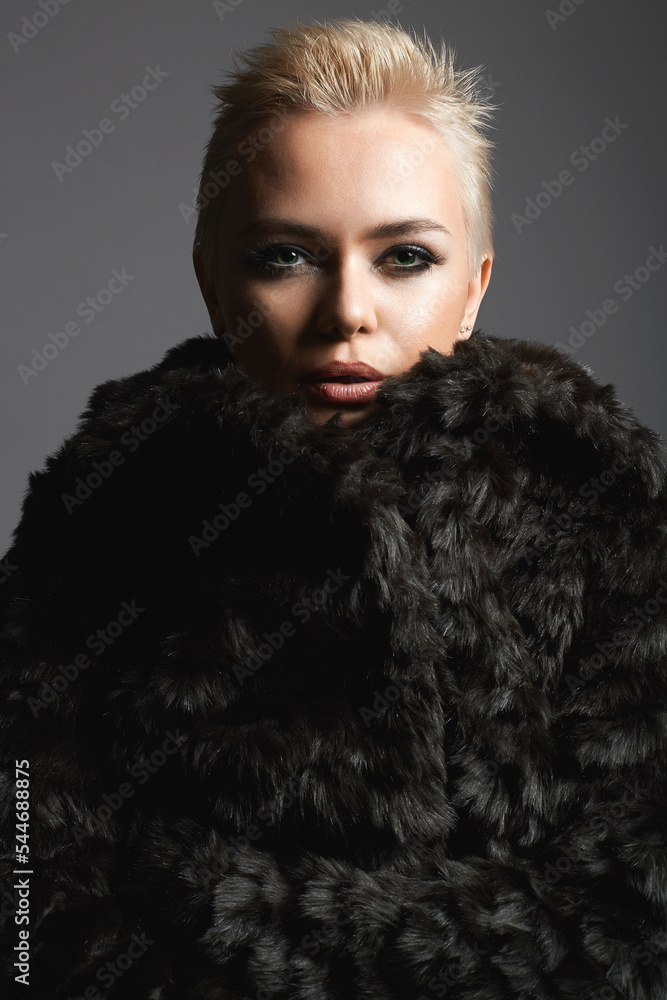 young short blond hair woman in fur. beautiful girl young short blond hair woman in fur. beautiful girl