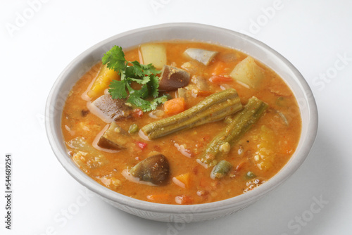 Sambar is a lentil-based vegetable stewsoup, cooked with pigeon pea and tamarind broth. It is popular in South Indian and Sri Lankan cuisines.