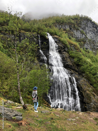 Norway travel card. Flam waterfall, Aurland Municipality, in Vestland, Norway. Most beautiful Scandinavian landscapes with falls. Top Norwegian viewpoints and popular Nordic tourist destinations photo