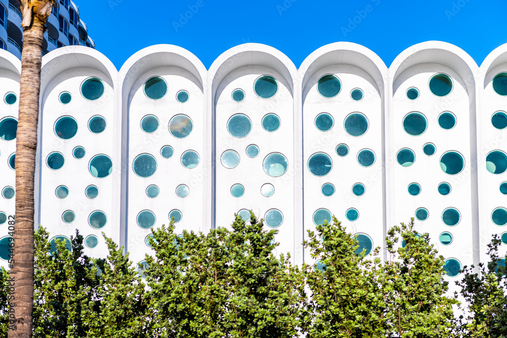 Fototapeta premium Abstract exterior architecture facade of art deco blue and white windows vintage residential building hotel apartment design in Miami South Beach
