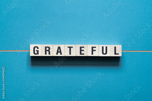 Grateful - word concept on cubes