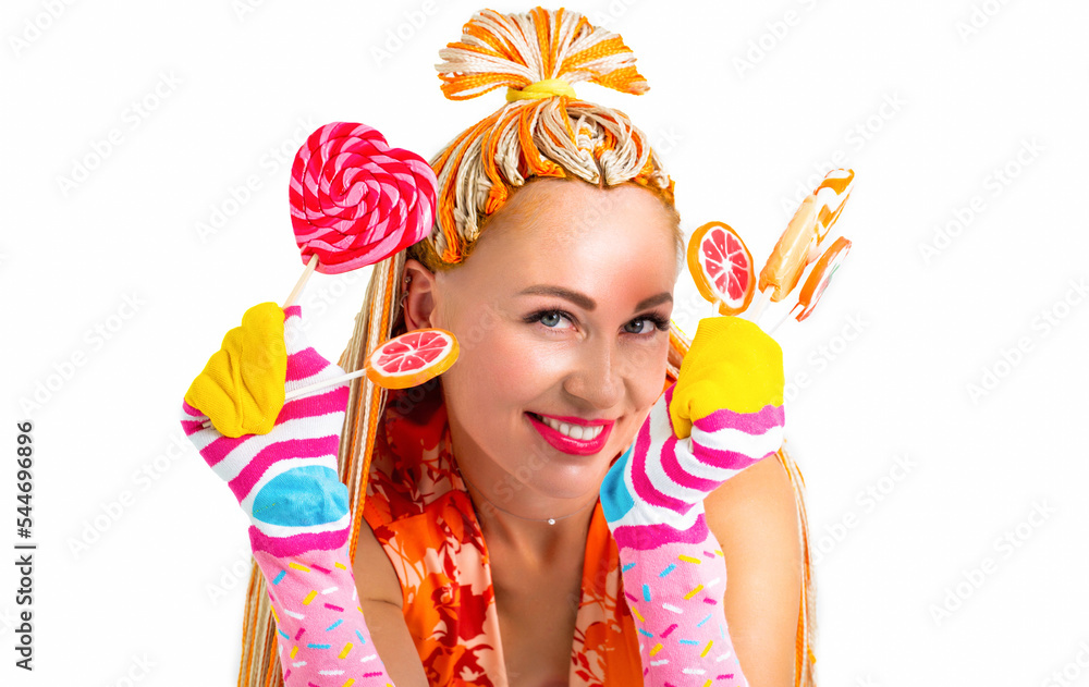 Attractive woman with lollipop in hand on white background. Girl braids, lollipops. Sexy girl eating lollipop, holding pink sweet colorful lollipop candy, sweets. Woman colorful orange hair braids