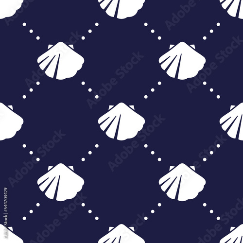 White sea shells on dark blue background seamless pattern. Marine underwater life. Best for textile, wallpapers, wrapping paper, package and home decoration. photo
