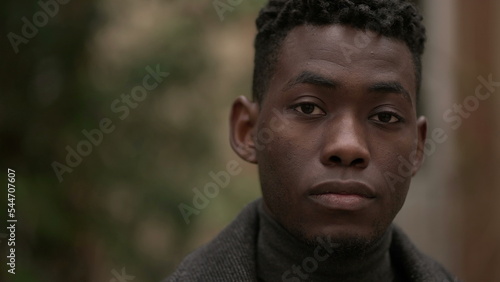 African man close-up face looking at camera