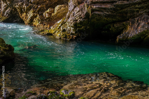 Green Water in the Gorge Between Craggy Rocks