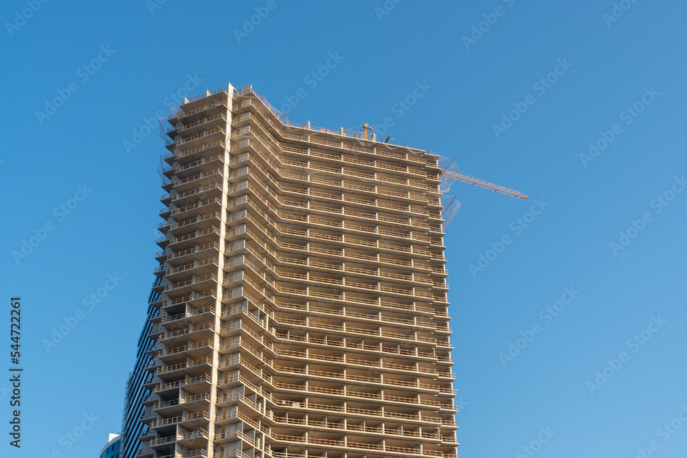 New multi-family houses against the blue sky New multi-family houses against the blue sky