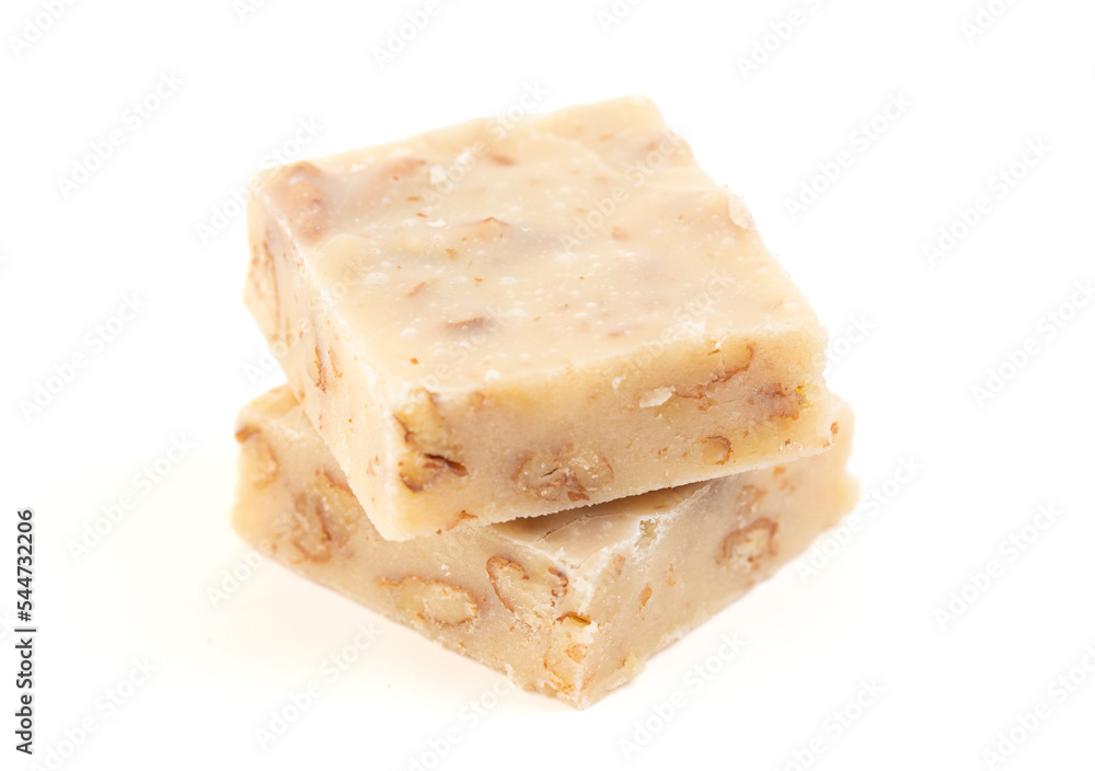 Pieces of Maple Walnut and Pecan Fudge Isolated on a White Background