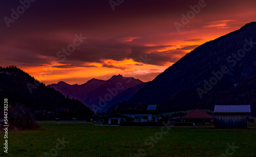 red sunset in mountains
