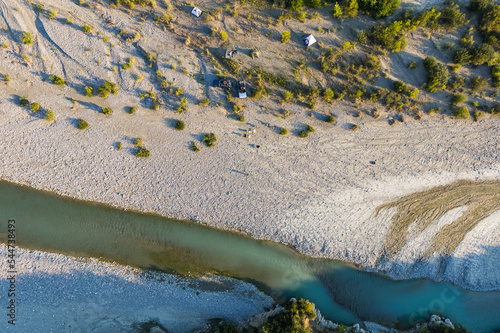 Aerial view of river Osumi by village Mbrakull near Polican in Albania in Summer sunrise photo