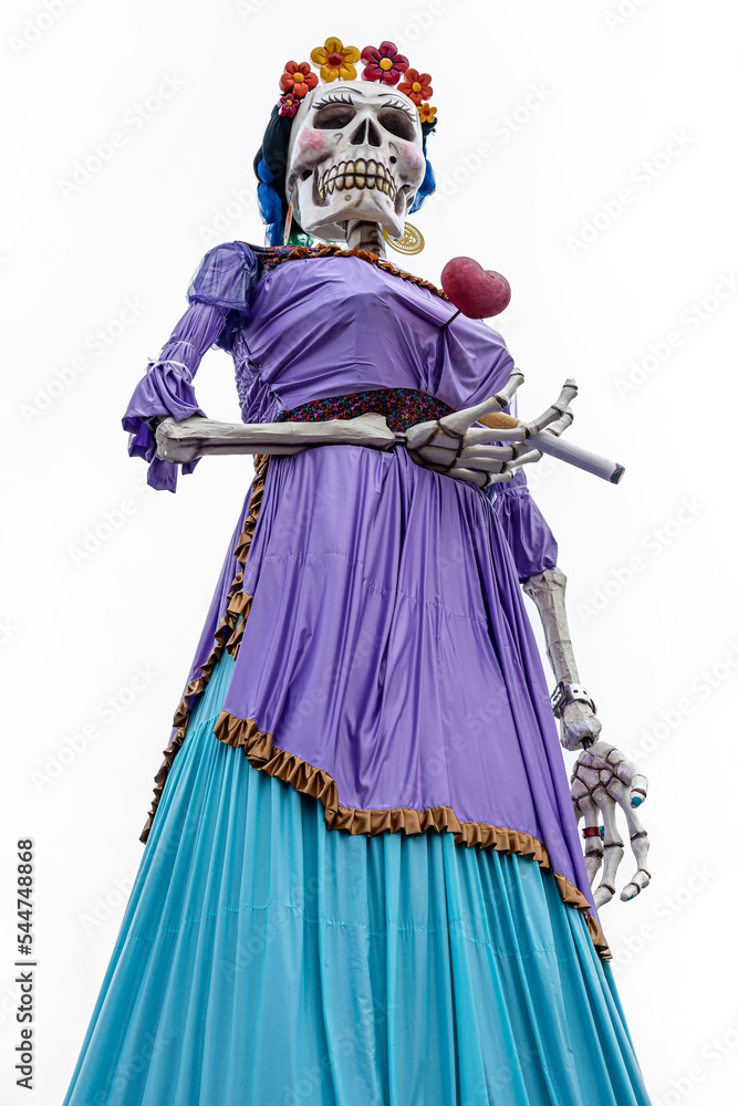 Huge lay figure of a Mexican Catrina as they name an elegant deceased woman in the Day of the Dead festival.
Craftwork of a woman representing the death but loved ones in Mexico.
