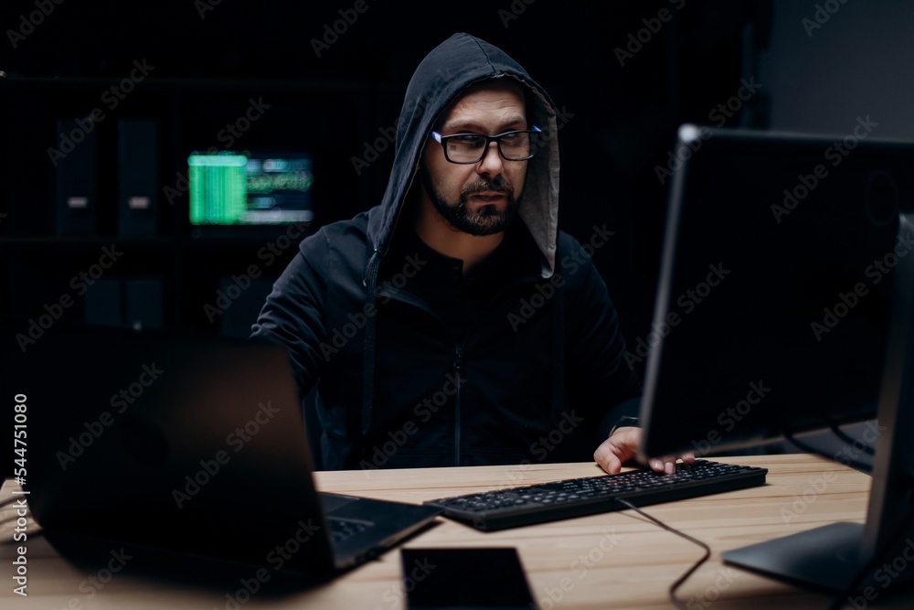 Hacker working on computer