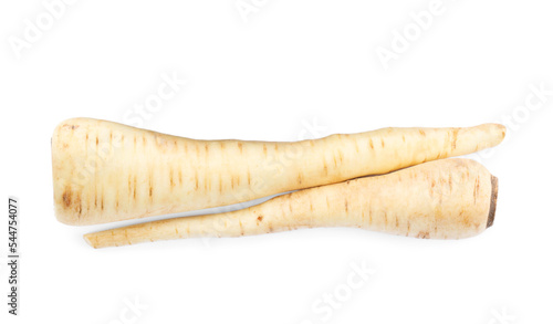 Tasty fresh ripe parsnips on white background, top view