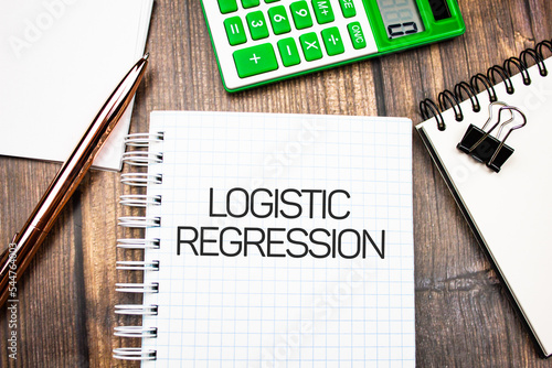 Logistic regression - text concept on notepad. Business concept.
