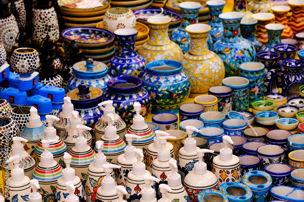 Multicolored Household ceramic items in the Street Market in India.