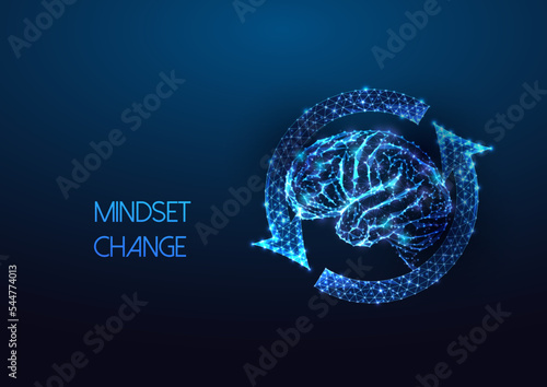 Mindset change concept with human brain in futuristic glowing low polygonal style on dark blue