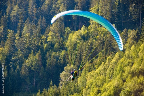 Paragliding flight in the austrian photo