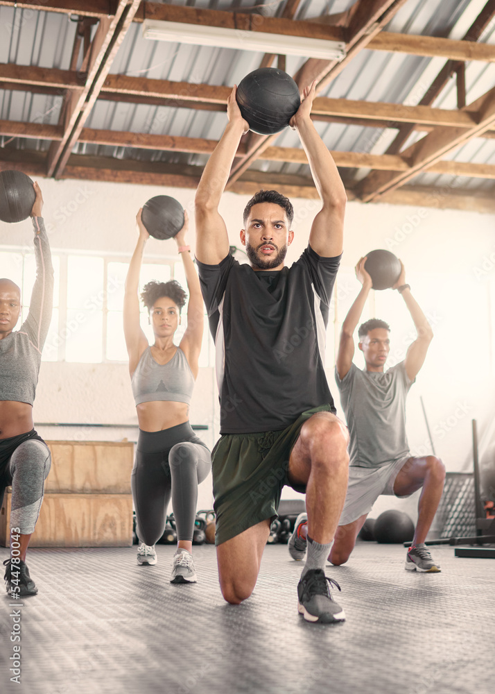 Fototapeta premium Fitness, training and medicine ball with people in gym and class for workout, health and sports exercise. Wellness, strong and weights with athlete bodybuilder for muscle, coaching and endurance