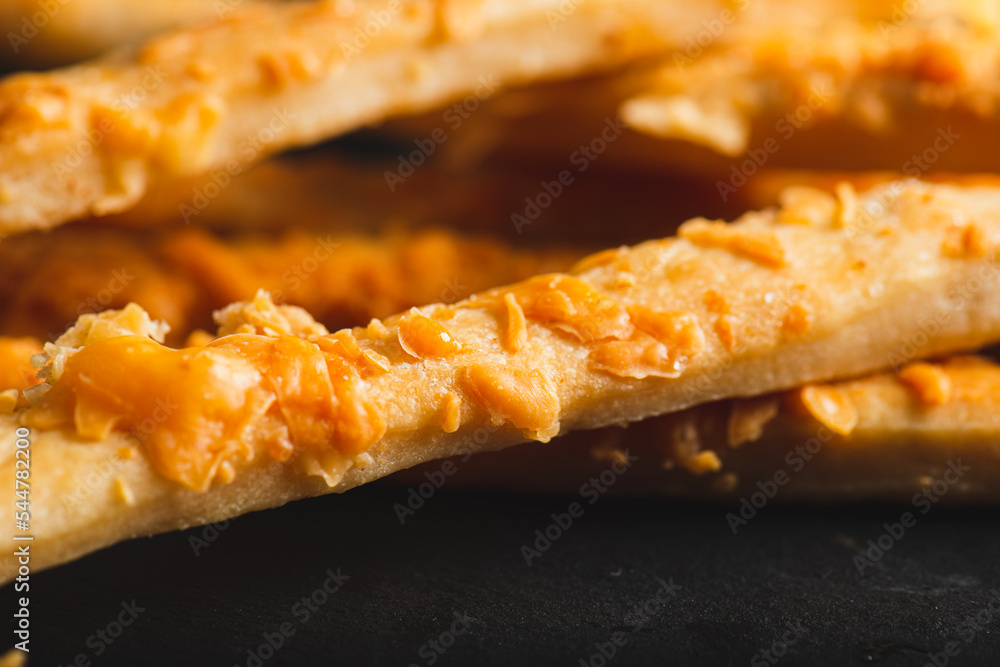 Grissini with Parmesan Cheese, also known as breadsticks, grissino, or dipping sticks, are generally pencil-sized sticks of crisp, dry-baked bread originating in Italy.