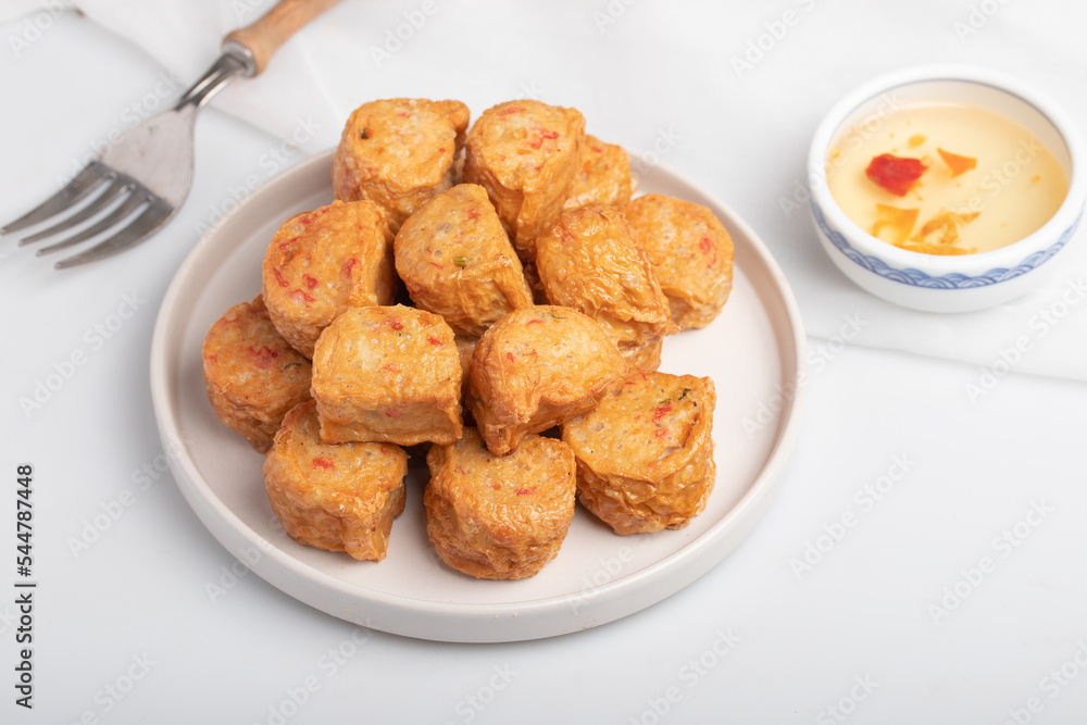 Deep Fried Chicken Roll in a white plate Deep Fried Chicken Roll in a white plate