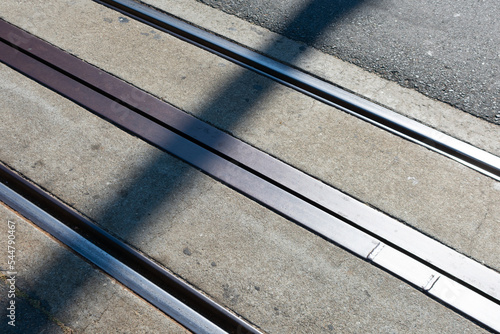 Cable slot lies centered between the two rails of the track providing an ingress for the grip for San Francisco cable car system