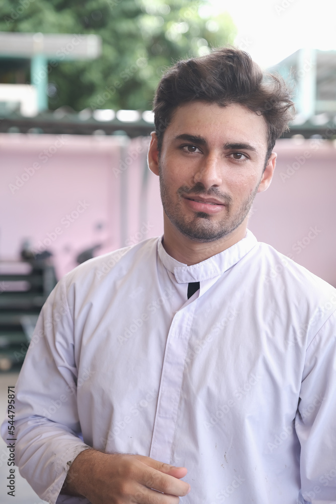 portrait Asian male factory worker wearing a uniform portrait Asian male factory worker wearing a uniform