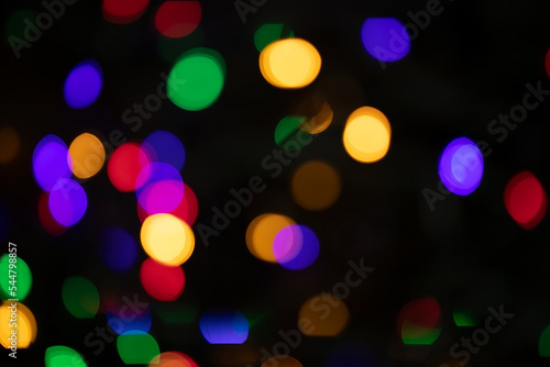 Christmas background. Blurry multi-colored lights. Kaleidoscope. Christmas Night Light