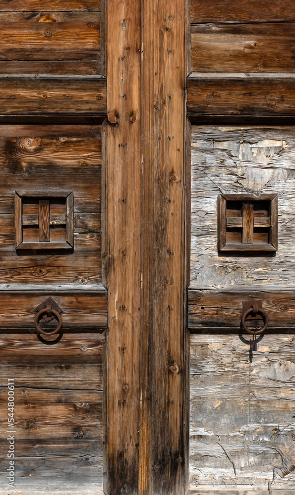 Background texture of old rustic weathered wooden door in Pugia, Italy