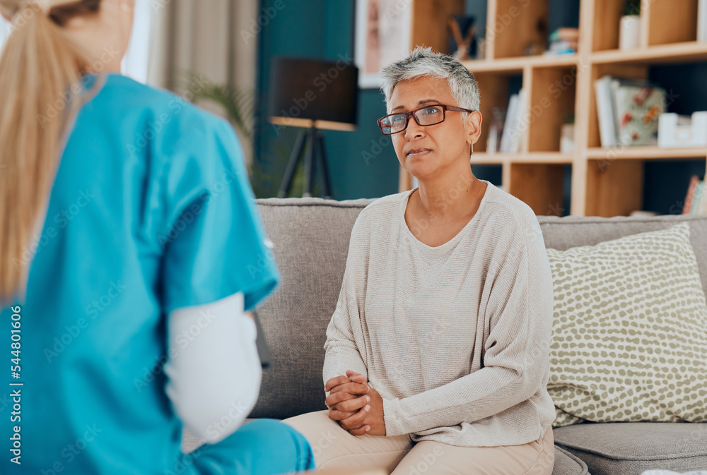 Obraz premium Nurse, senior woman and consultation on sofa in home for health check up or examination. Healthcare, consulting and female doctor with elderly patient in living room discussing treatment options.