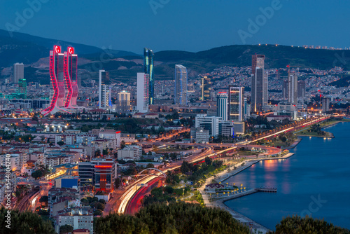 Izmir, Turkey Night view from the sea of the new skyscrapers district of Izmir city. Izmir is Turkey's third largest city.