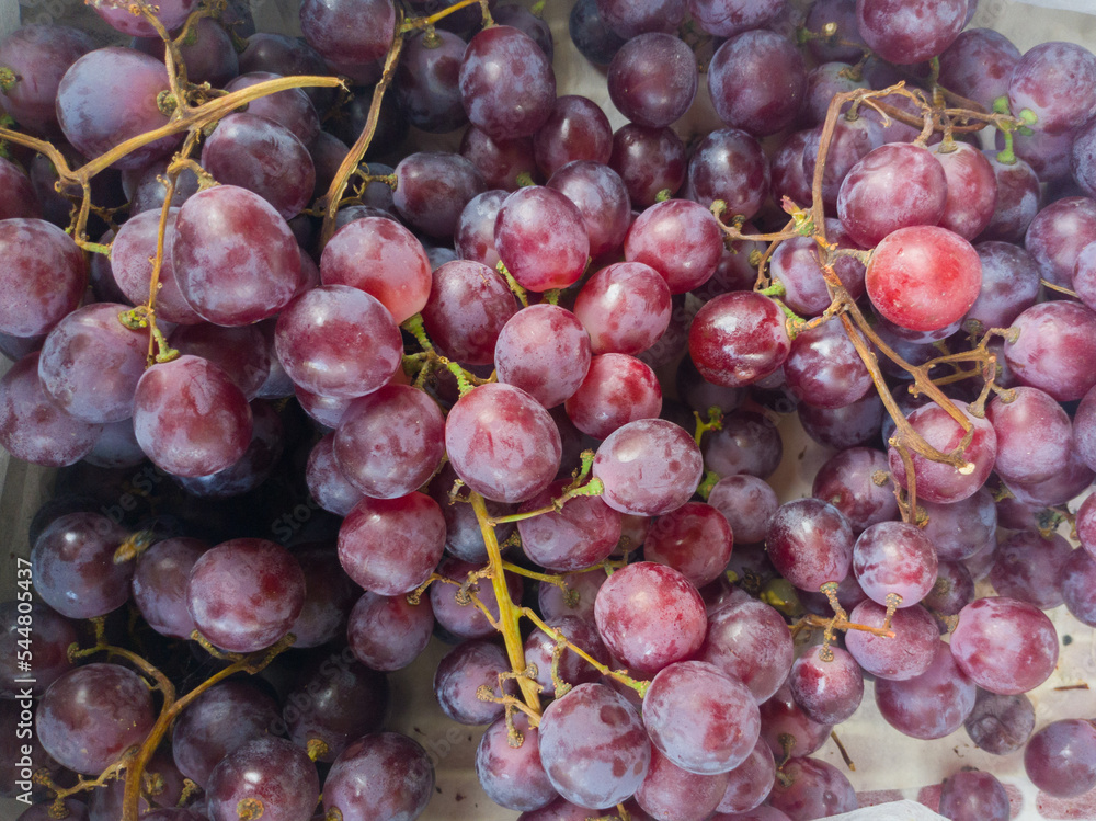 pile of red grapes for sale in the market pile of red grapes for sale in the market