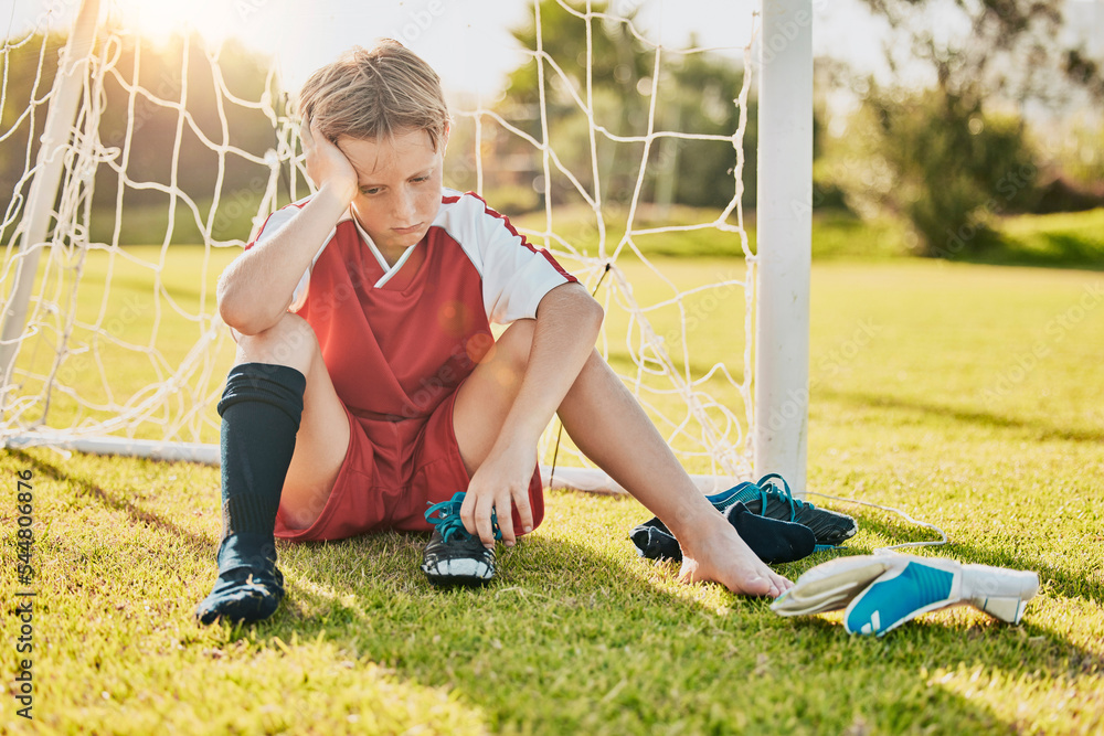 Sports, football loss and child sad over fitness game defeat, training  competition fail or athlete contest. Kid depression, mental health problem  and youth player depressed from soccer field bullying Photos | Adobe