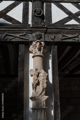 Aitre St. Maclou - Rouen , France: The Atrium of San Maclovio, or Court of San Maclovio, French Aitre Saint-Maclou is an old cemetery-ossuary where plague victims were buried. 