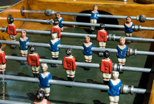 Vintage foosball table with hand painted figures