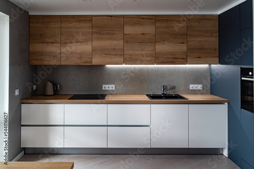 Kitchen interior with wooden cabinet
